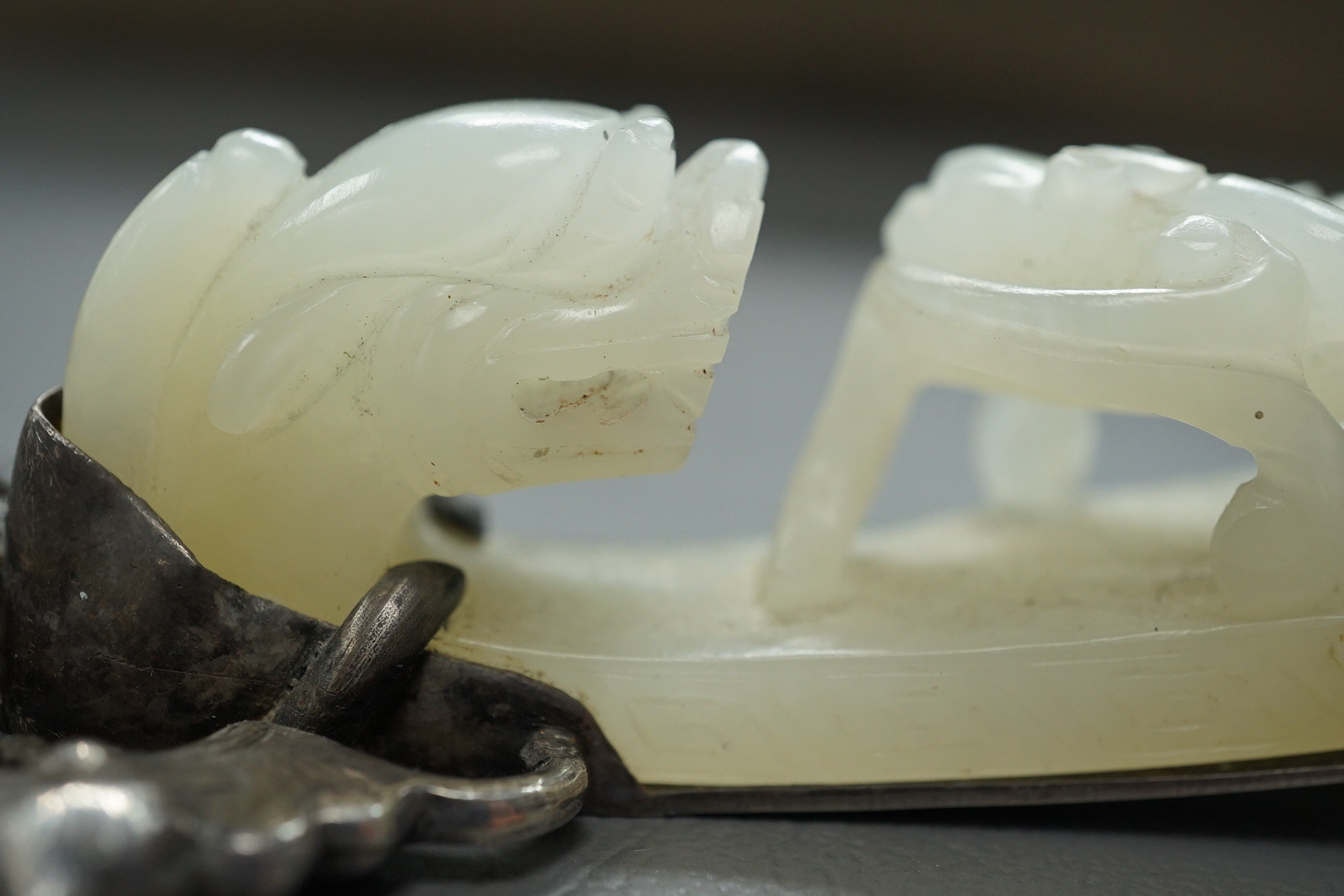 A Chinese jade and cabochon mounted hand mirror, the jade 18th/19th century